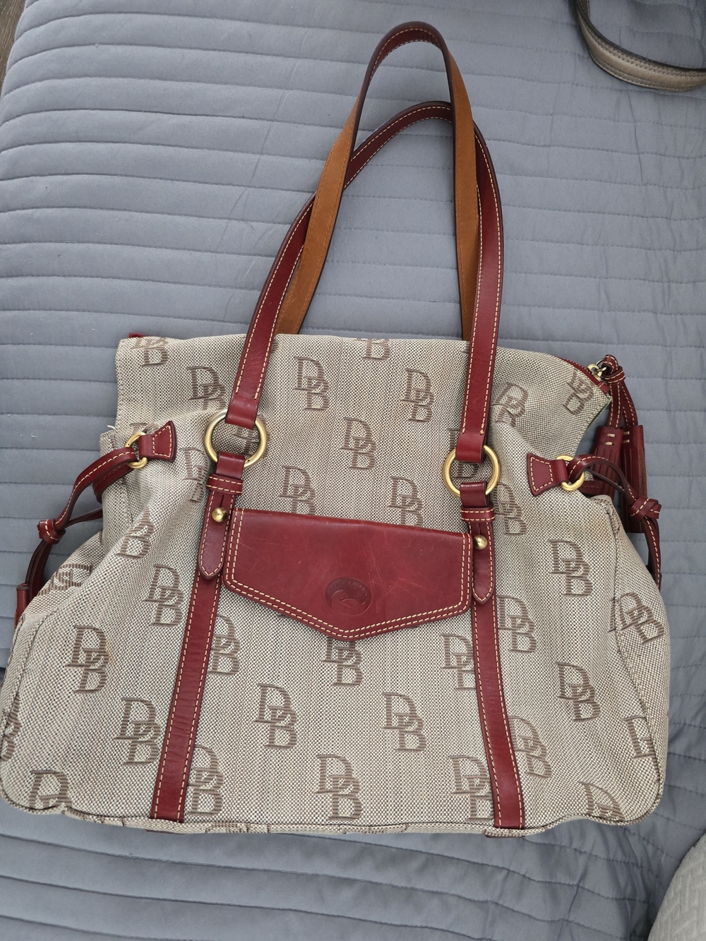 Dooney & Bourke Beige Canvas Tote with Red Leather Trim